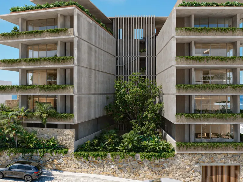A boutique building with green terraces in downtown Puerto Vallarta